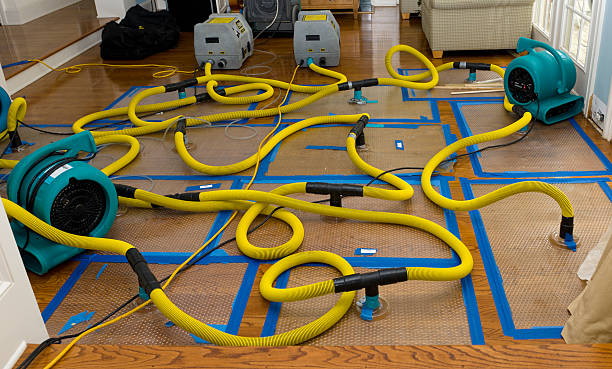 Professional Flood Damage Restoration technician working in Fayetteville, TN